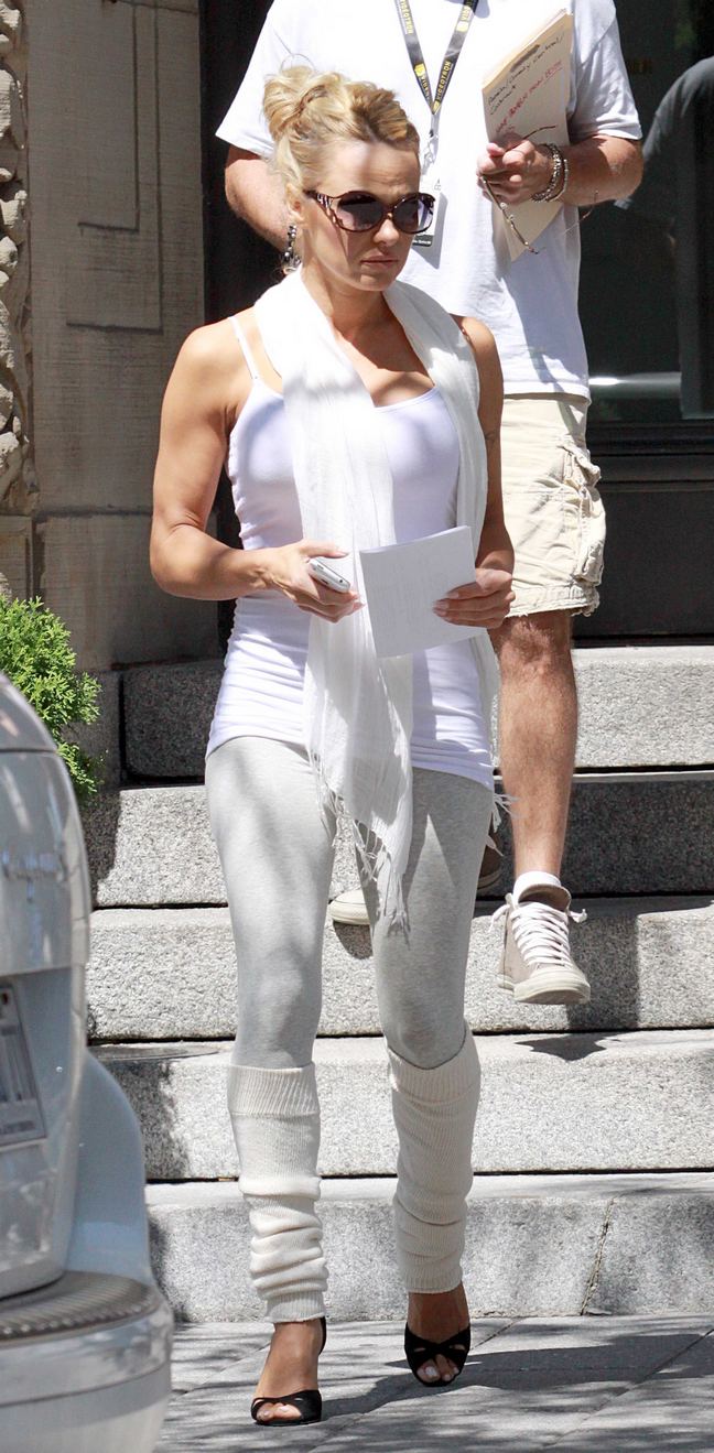 Pamela Anderson, White leg warmers, white pants, white top, sunglasses, black peep toe heels